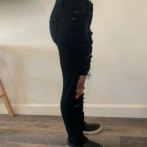 Distressed mid to low waisted denim